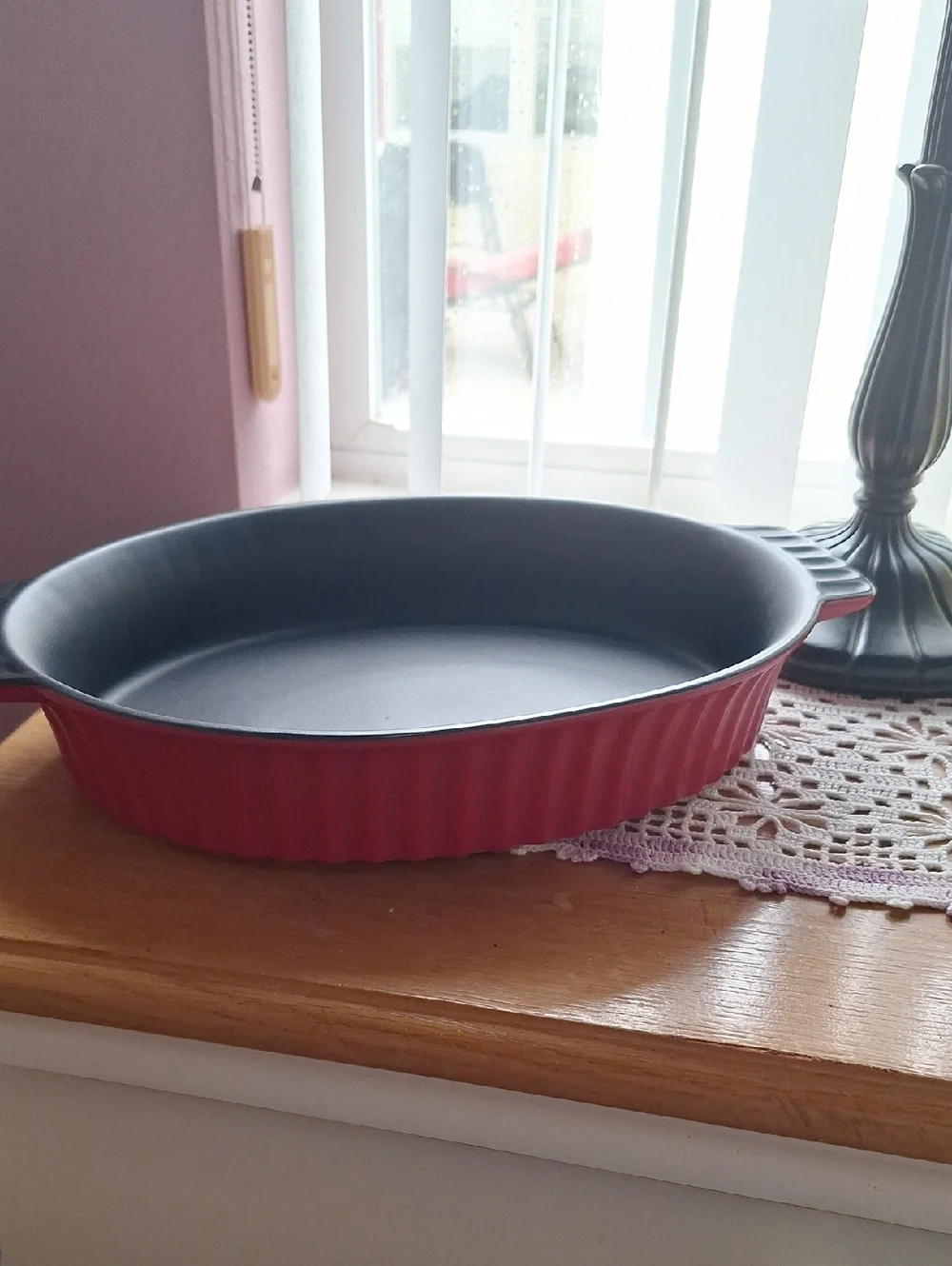 Red Oval Ceramic Bake Dish with Black Interior - Versatile Oven Bakeware